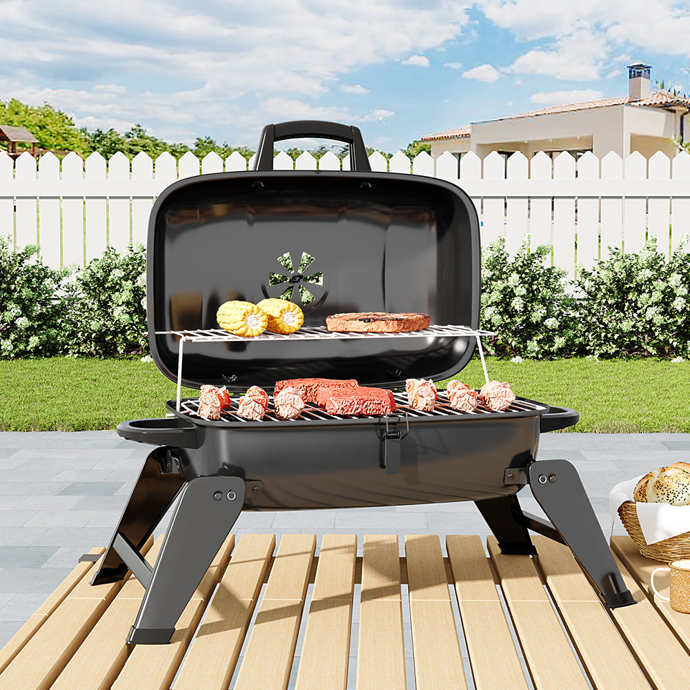 Portable Charcoal BBQ Grill on Patio Table – Ideal for Outdoor Dining and Small Gatherings