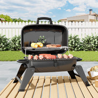 Portable Charcoal BBQ Grill on Patio Table – Ideal for Outdoor Dining and Small Gatherings