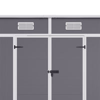 close-up of door handles and ventilation panels on 6x4ft light grey plastic outdoor storage shed
