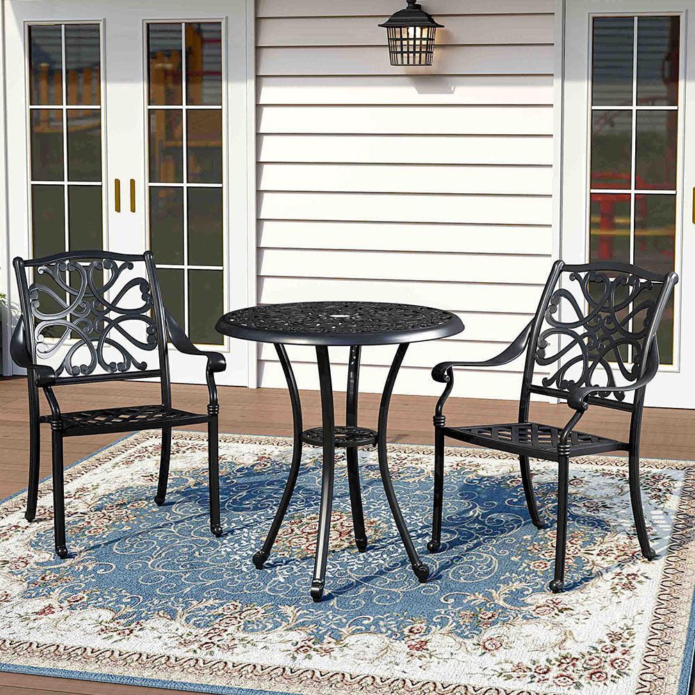 Poinciana Hollow Metal Round Patio Table Set Up in Garden – Outdoor Dining Area