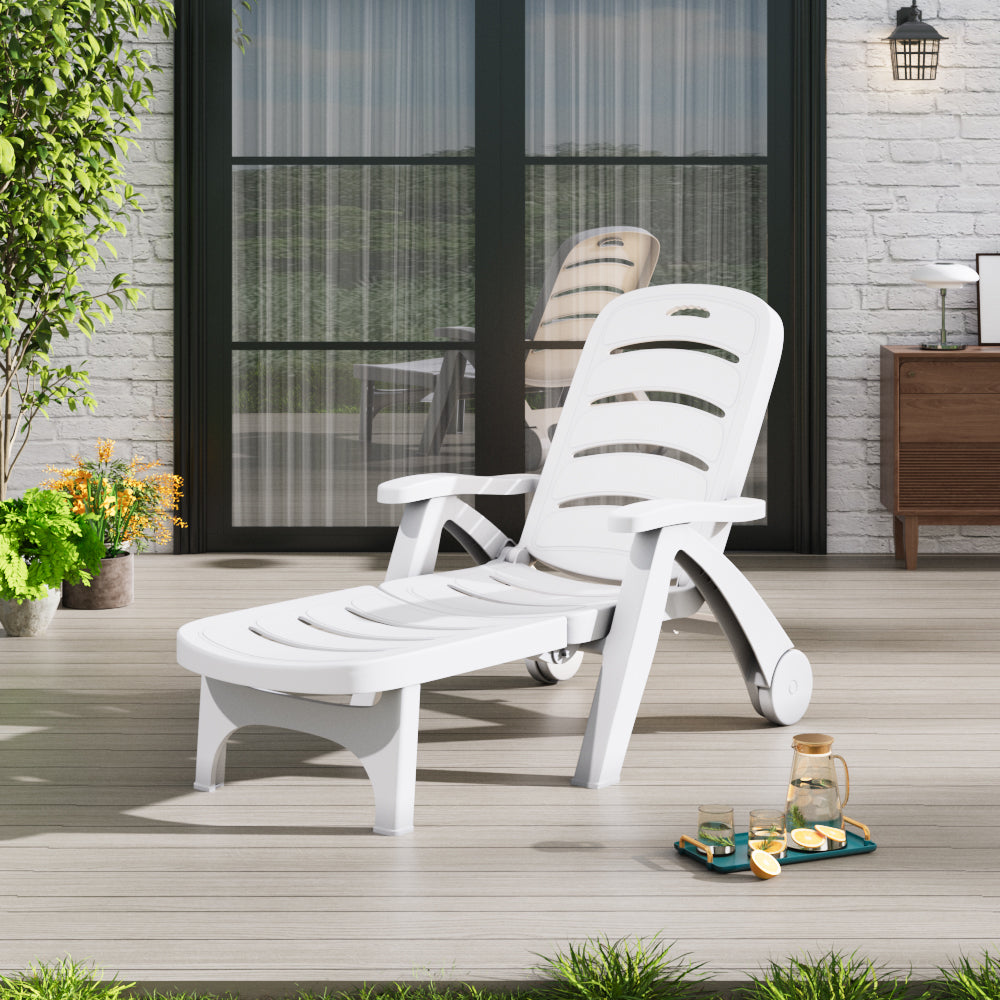 White plastic foldable garden lounger recliner with wheels – portable poolside chair for outdoor relaxation