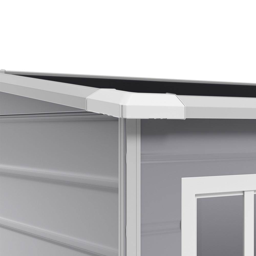Weather-resistant roof detail – sloped grey plastic roof of 5x4ft outdoor storage shed with drainage design