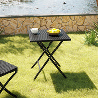 Square Folding Rattan Camping Table Set Up on Patio - Ideal for outdoor dining, camping, and garden seating
