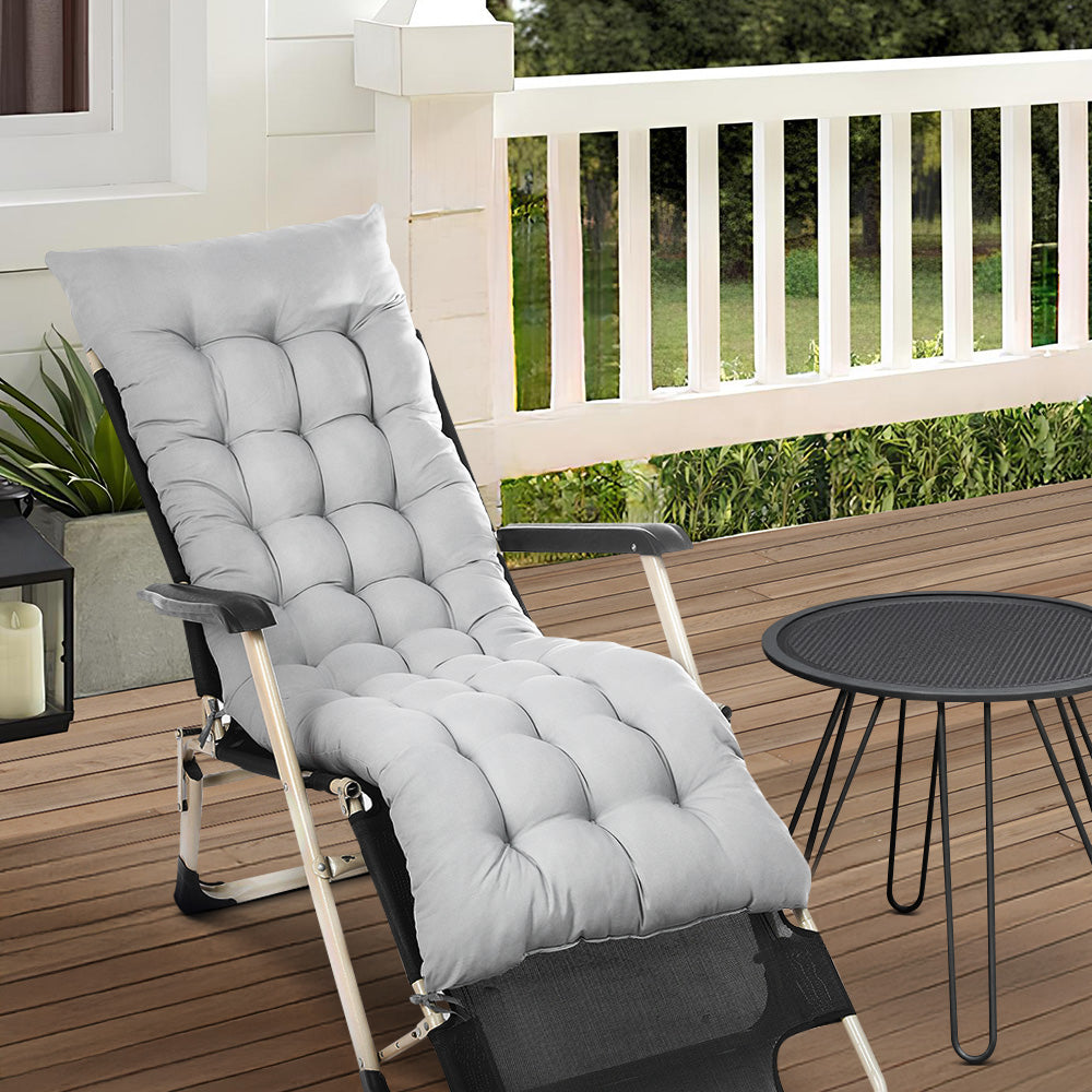 Grey Outdoor Seat Cushion placed on a garden patio chair, adding comfort and style to your outdoor space