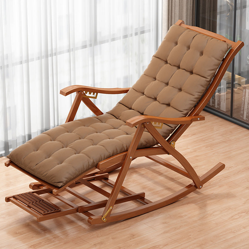Garden view of foldable bamboo lounger in brown color finish