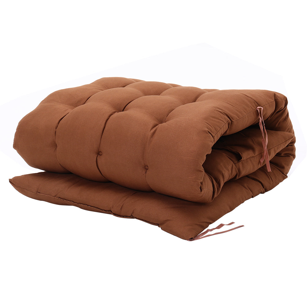 Coffee Outdoor Seat Cushion rolled up on white background, showing its compact storage capability
