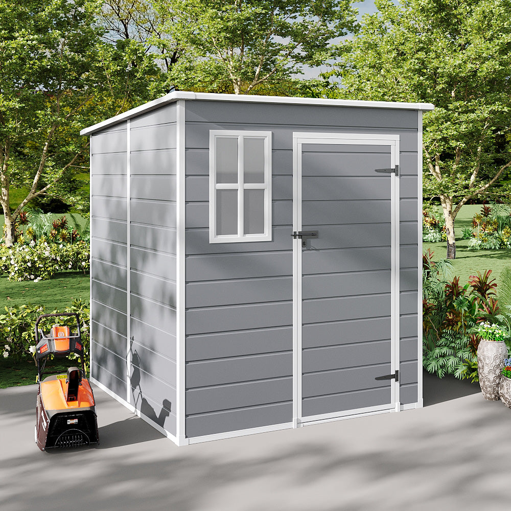 Modern 6x6ft grey plastic outdoor shed with secure door and side window – shown in residential garden