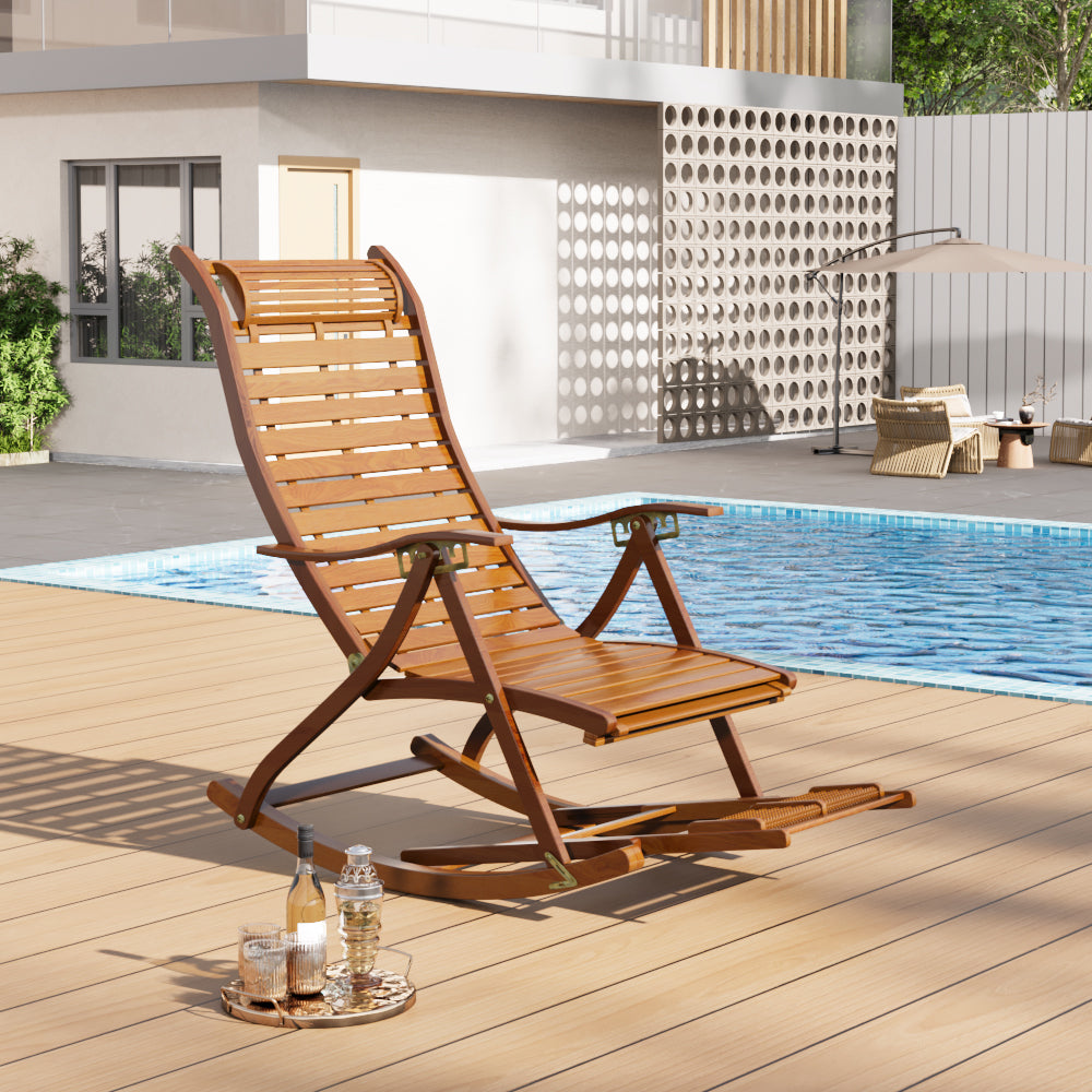 Brown bamboo reclining chair on terrace with tropical plants