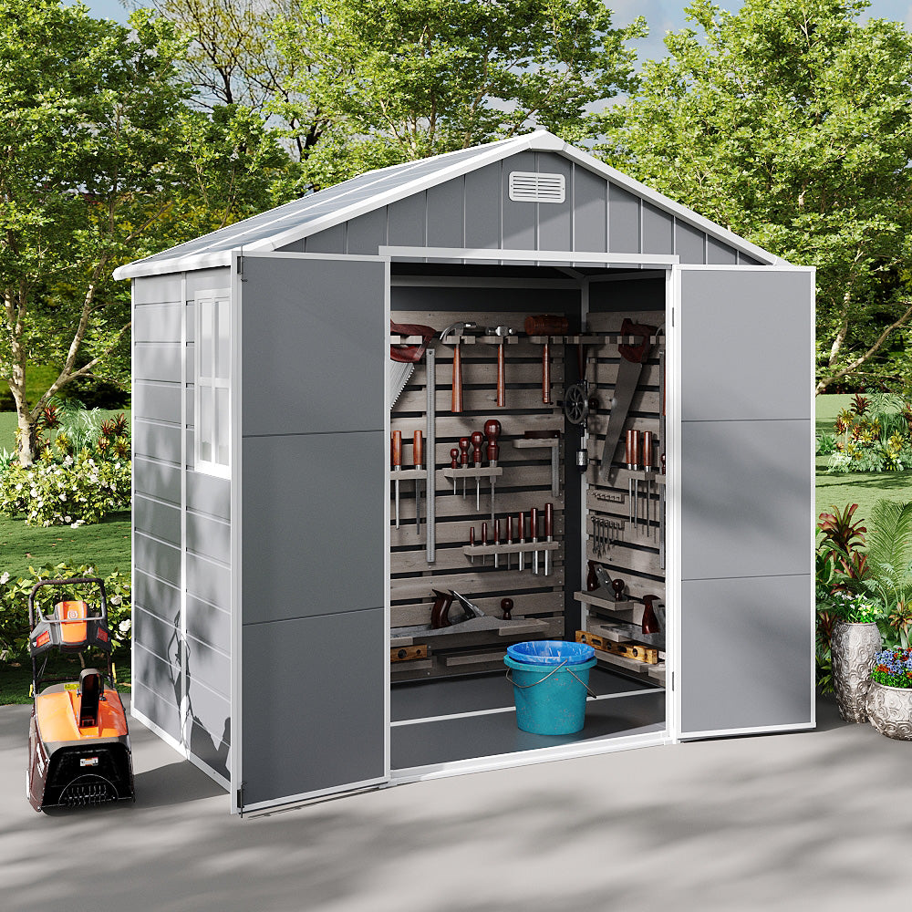 8x6ft plastic outdoor storage shed with open doors showing organized tools – perfect for tidy backyard setup