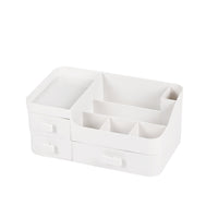 White plastic makeup organizer with open top dividers and two front drawers