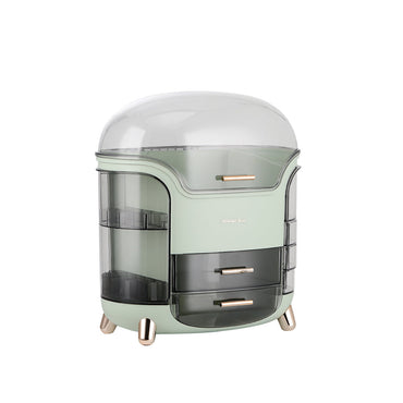 Mint green cosmetic organizer with clear dome lid, front drawers, and side compartment