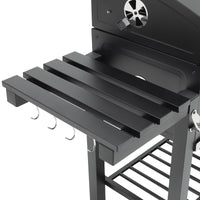 Side shelf detail of 33x43 inch outdoor charcoal grill – sturdy metal platform for prep and utensil storage