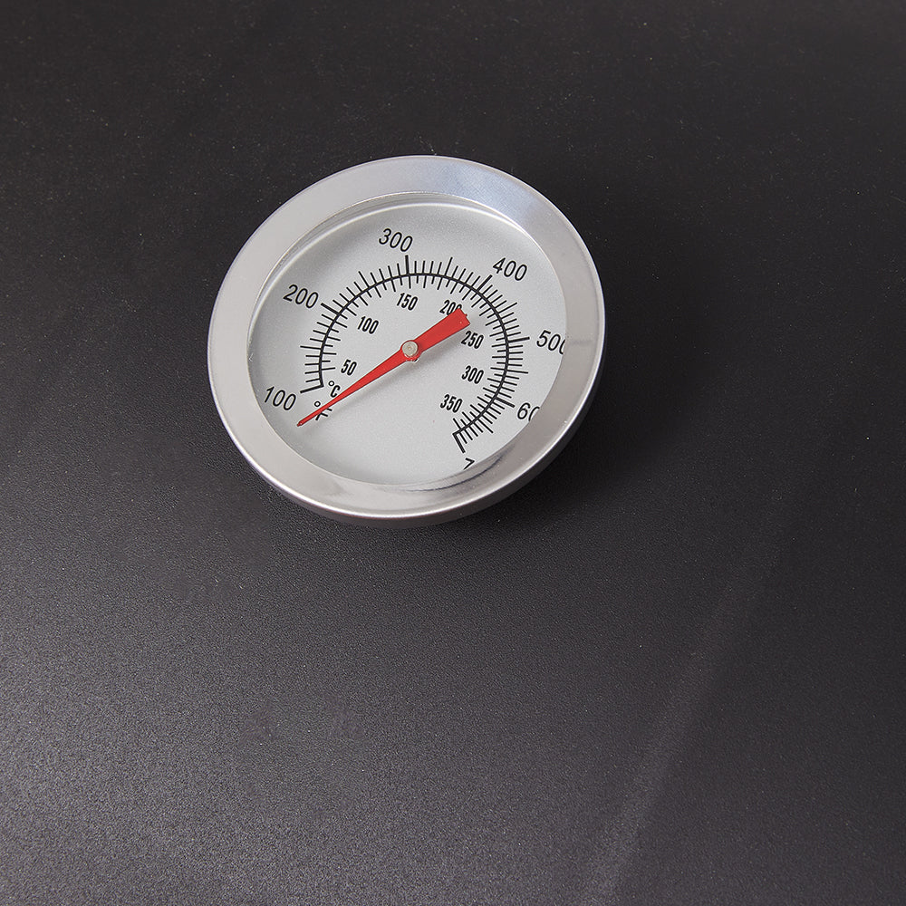 Close-up detail of charcoal BBQ grill smoker lid with handle and chimney – portable barrel design for outdoor grilling