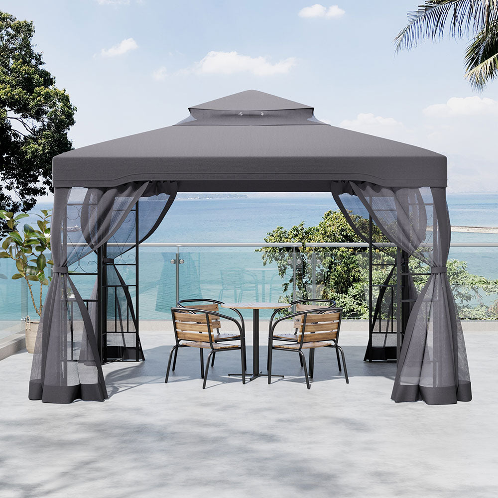 Outdoor Lounge Under Dark Grey Gazebo Shade – Elegant Garden Setup for Summer