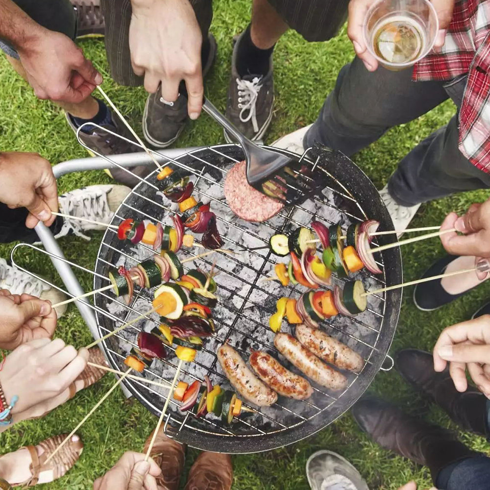 Close-Up of 3-in-1 Charcoal BBQ Grill During Outdoor Meal – Juicy Meat and Smoky Flavour