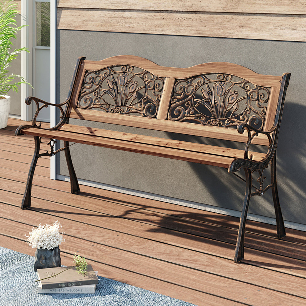 Wood and Cast Iron 2-Seater Bench Placed on Garden Lawn – Elegant Outdoor Furniture