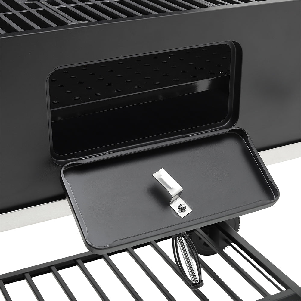 Close-up of air vent on barrel charcoal BBQ grill – adjustable damper for smoke and heat control