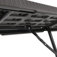 Underside View of Black Rattan Folding Chair – Sturdy Frame and Leg Structure