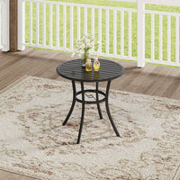 80cm black metal bistro table placed on a deck with greenery – modern garden setup