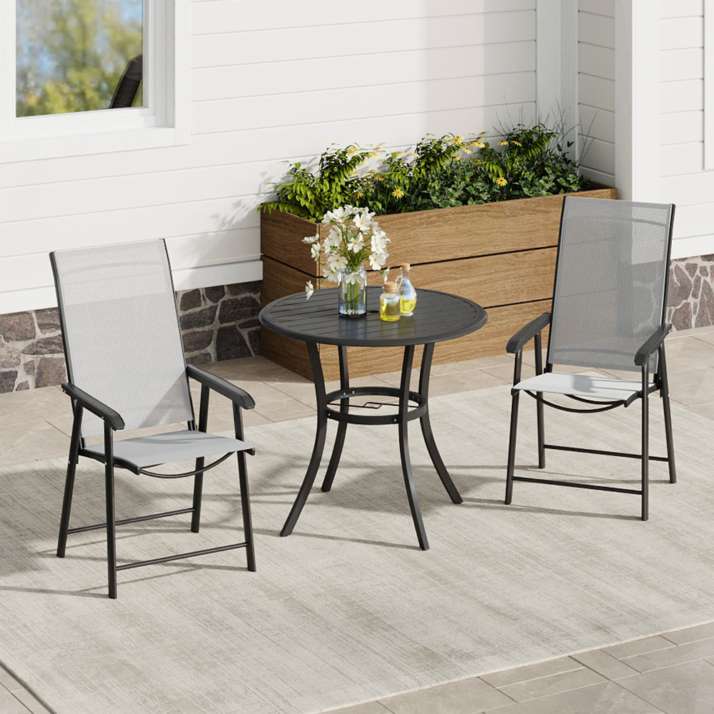 Metal slatted outdoor table styled in a backyard – ideal for small garden or balcony space