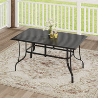 150x90cm Black Rectangular Garden Table on Stone Patio – Stylish Outdoor Dining