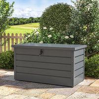 charcoal black steel garden storage box – closed and placed in patio or garden setting