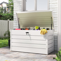 white steel garden storage box – closed and placed beside garden wall or patio bench