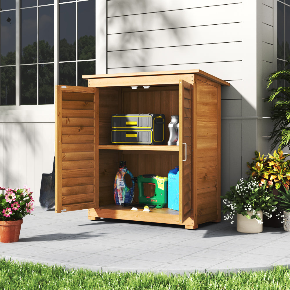 Rustic Wooden Garden Storage Cabinet with Open Doors – Compact Tool Shed in Use Next to House Wall