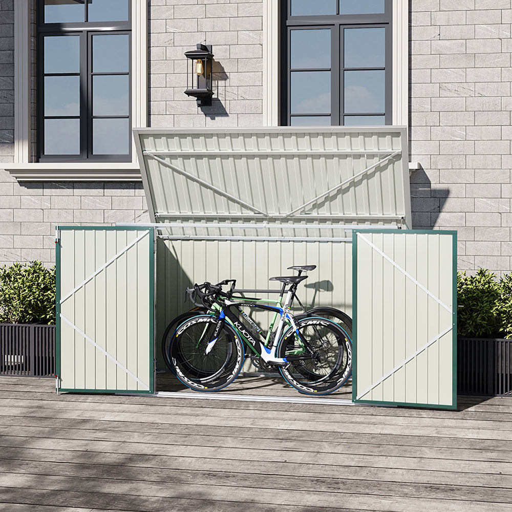 green metal shed against wall with open door – used for secure bike storage