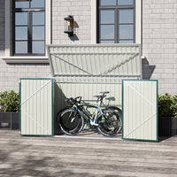 green metal shed against wall with open door – used for secure bike storage