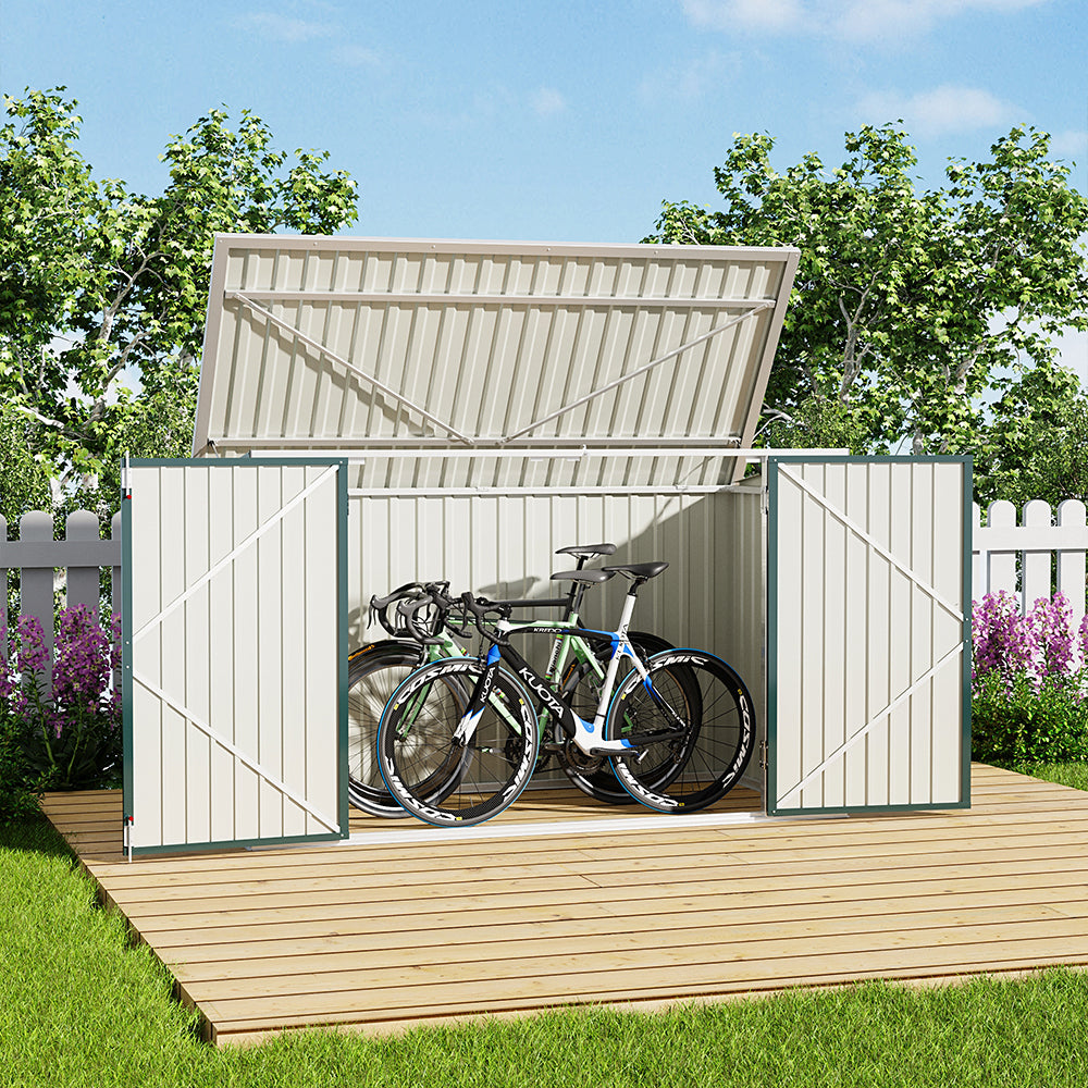 green steel shed open with bicycles inside – placed in backyard garden setting