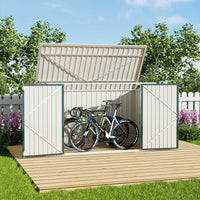 green steel shed open with bicycles inside – placed in backyard garden setting