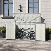 grey metal storage shed placed against house wall with bike inside – 7x3ft lockable