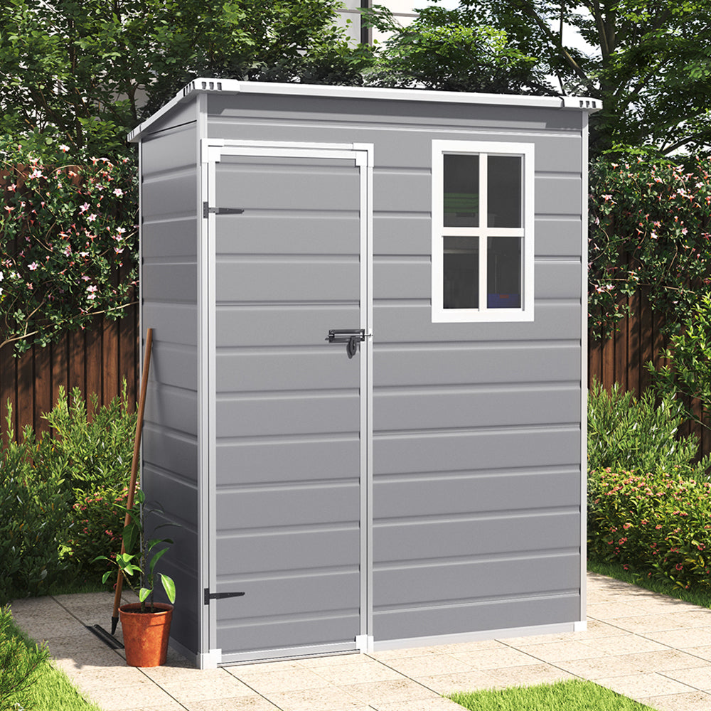 5x3ft grey plastic outdoor shed with closed door, sloped top design placed in garden