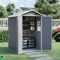 side view of 6x4ft grey garden storage shed with open door and organized tool storage inside
