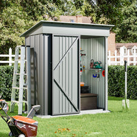 backyard setup showing 5x3ft grey garden shed with open door, storing tools and garden equipment