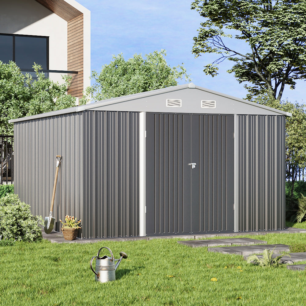 10x12ft galvanized steel motorcycle shed with closed doors in a backyard setting, ideal for outdoor storage