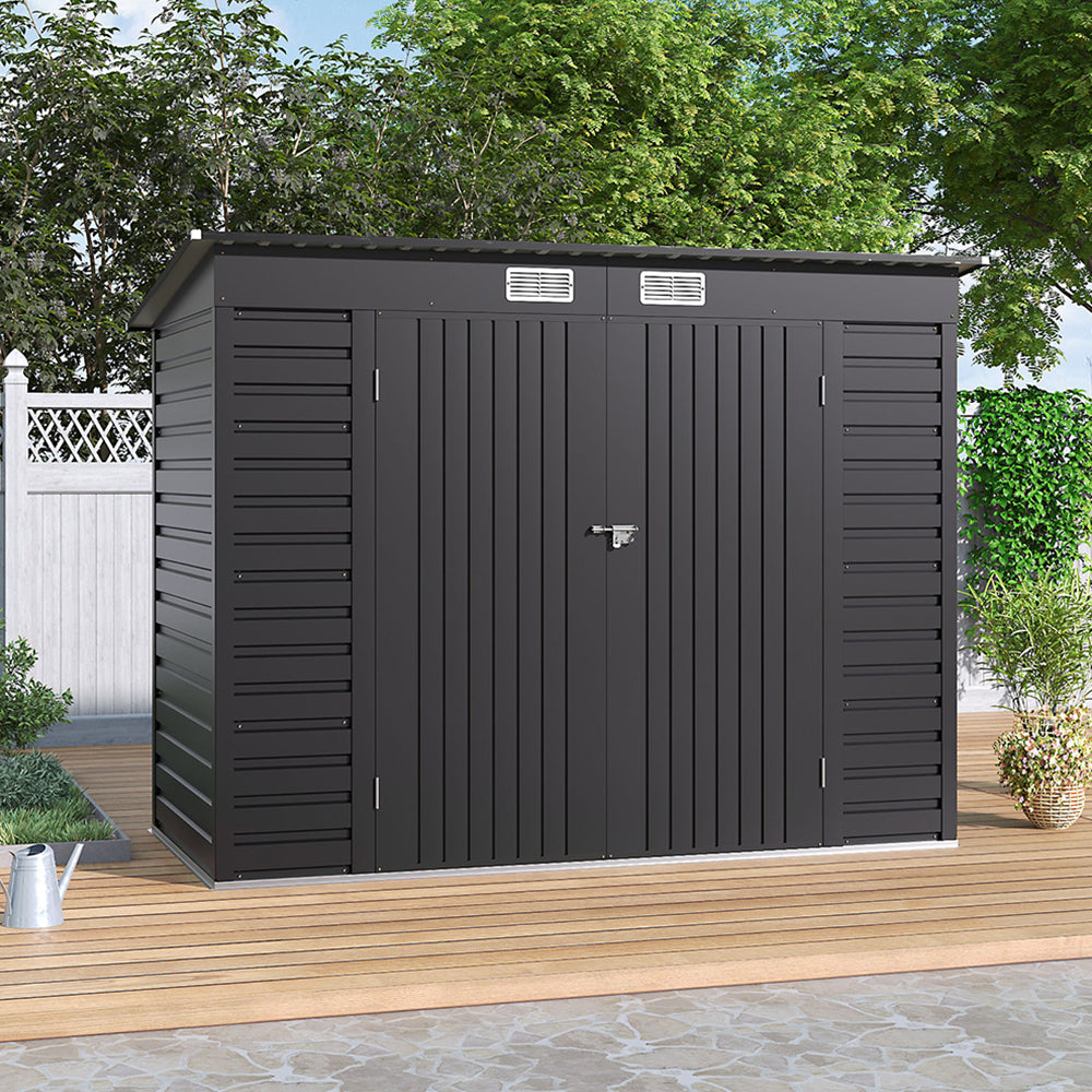 8x4ft galvanized steel garden shed with closed dual doors placed in outdoor garden setting
