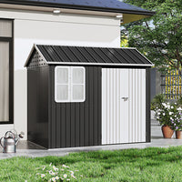 Sleek 8x5ft apex roof outdoor storage shed in charcoal black – closed-door view in garden setting