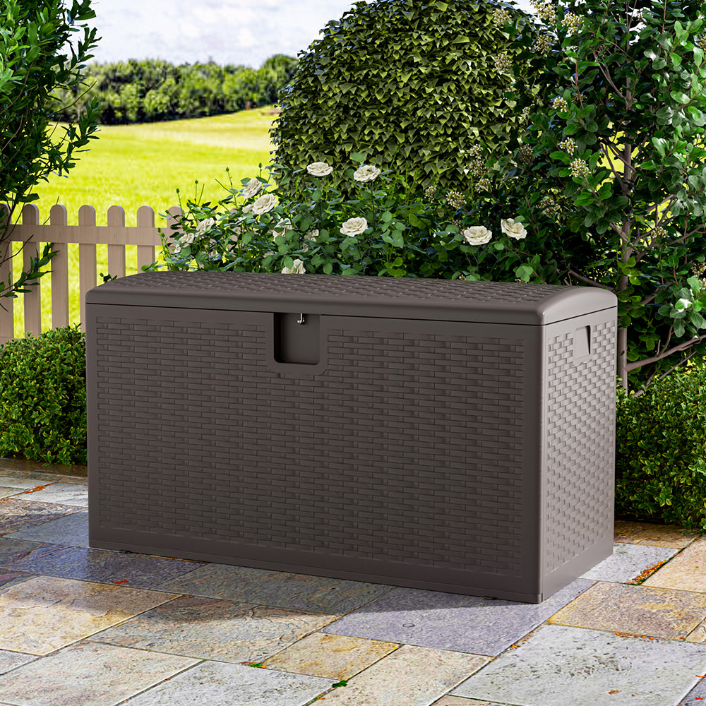 Brown rattan garden storage box in patio setting – outdoor waterproof box for storing cushions and tools