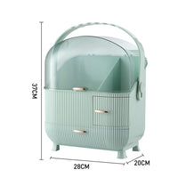 Mint green makeup organizer with clear dustproof dome, ribbed drawers and carry handle