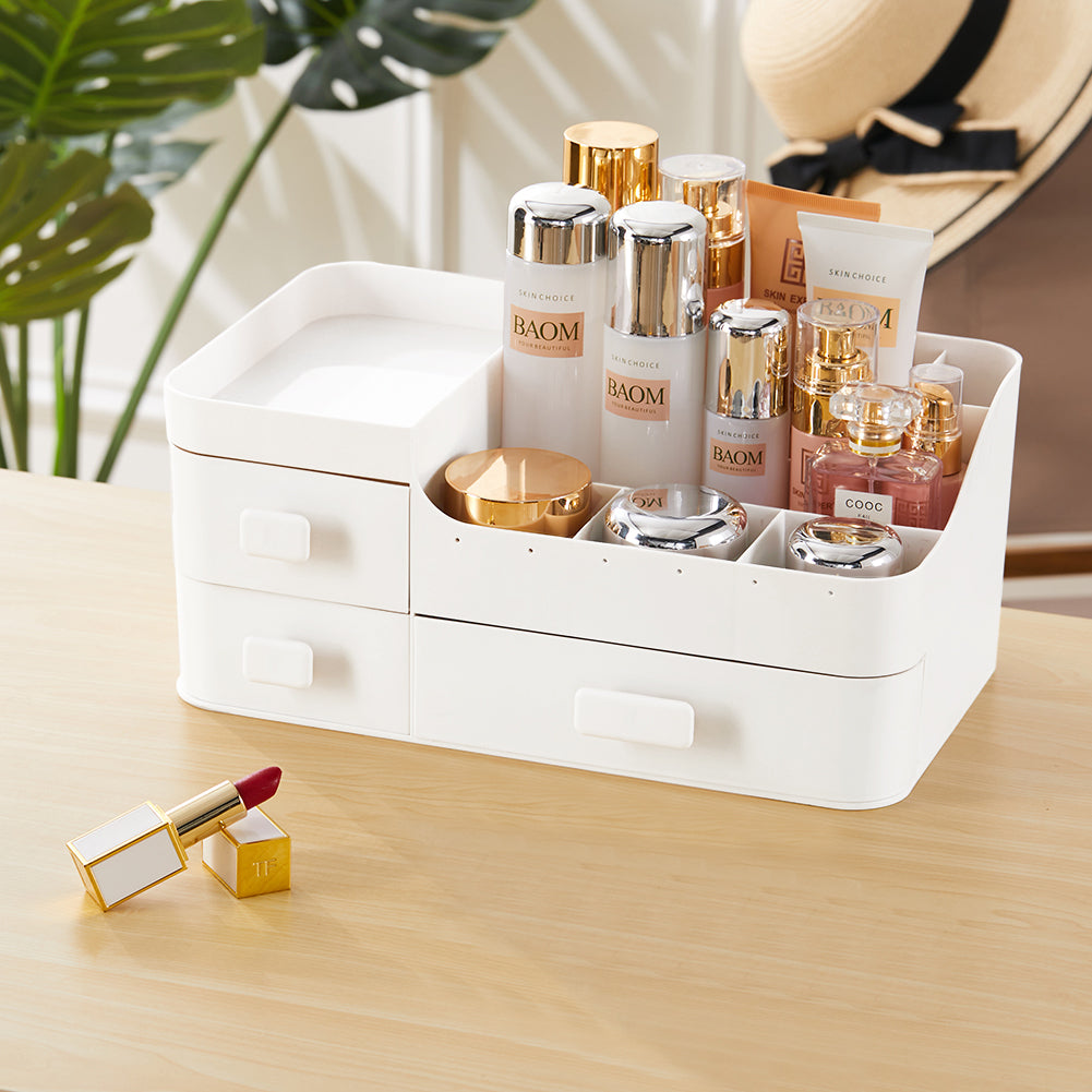 White plastic makeup drawer organizer with cosmetics and beauty bottles inside