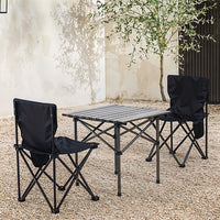 Foldable Camping Table and Chairs Set in Use at Campsite - Perfect for family outdoor dining and activities