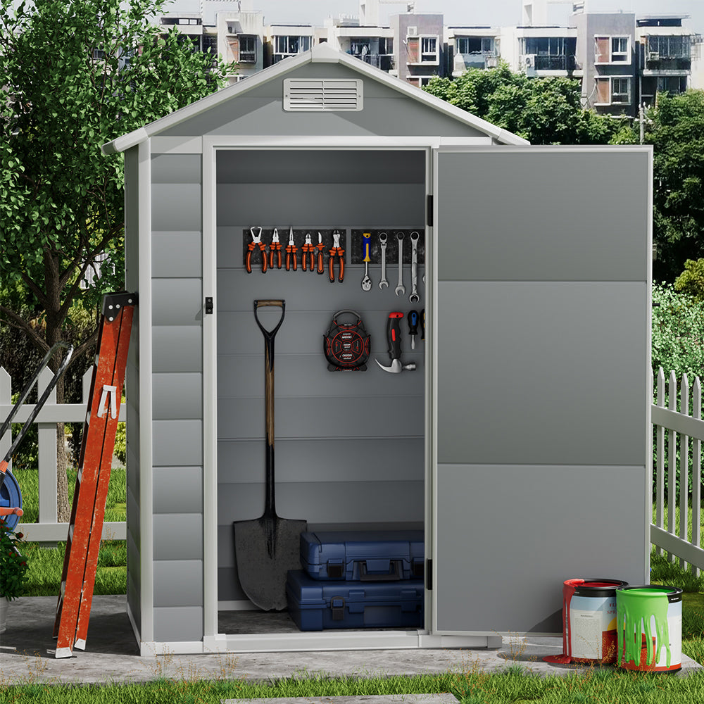 4x3ft grey plastic garden shed with open hinged door – organized outdoor tool storage in backyard setting