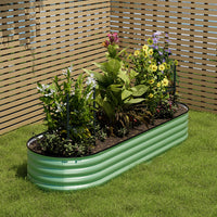 Light green oval raised garden bed – weather-resistant outdoor planter made from galvanized steel for long-lasting use