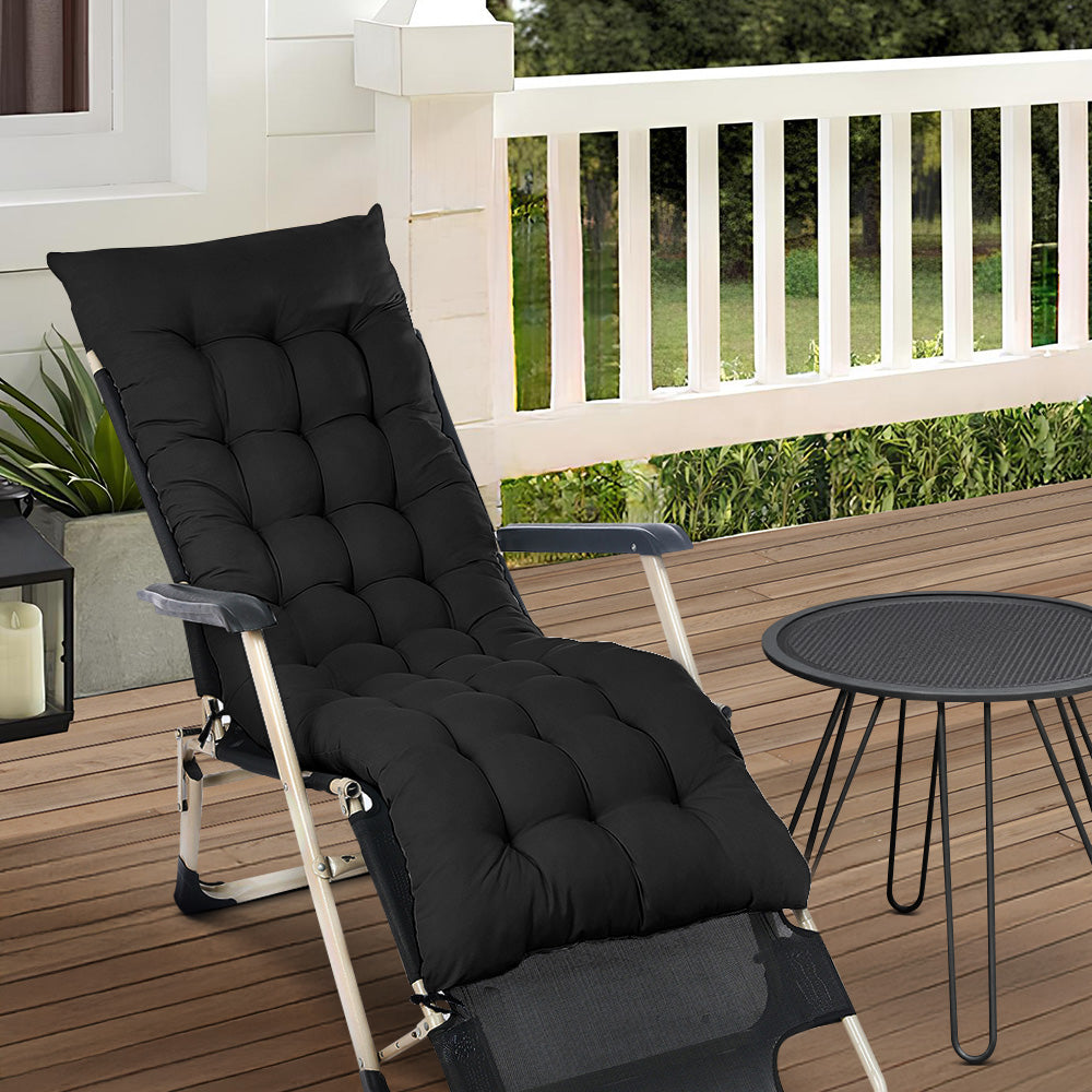Black Outdoor Seat Cushion placed on a garden patio chair, adding comfort and style to outdoor seating