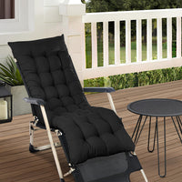 Black Outdoor Seat Cushion placed on a garden patio chair, adding comfort and style to outdoor seating