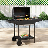 Outdoor Charcoal BBQ Grill with Dual Side Tables in Garden Patio Setup – Perfect for Summer Grilling